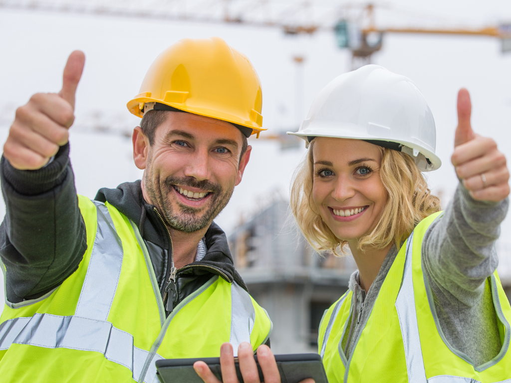 Construction Workers Giving Thumbs Up with Tablet